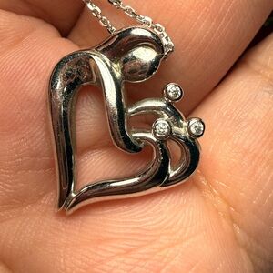 Elegant Silver Heart Pendant Necklace with diamonds